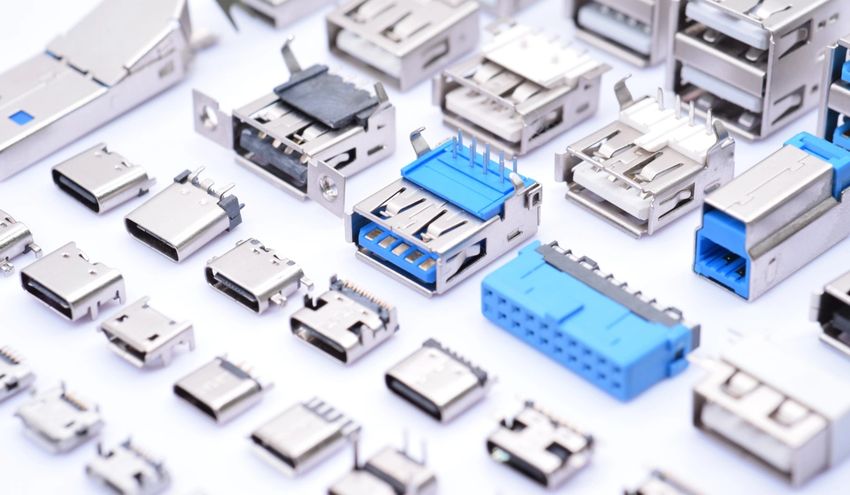Different types of USB connectors lined up to show their shapes and sizes